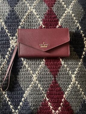 kate spade burgundy Laurel way envelope wristlet